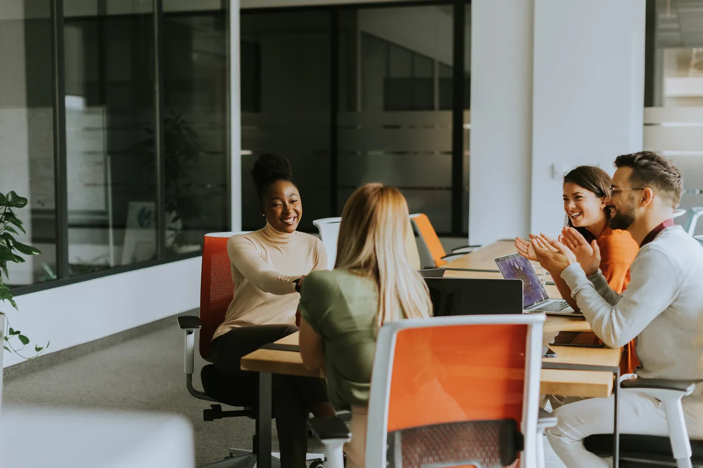 The LeelynHR team collaborating in an open office